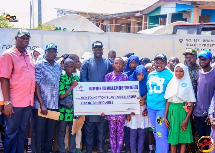 [PHOTOS] MOK Foundation Awards 2025 JAMB Scholarship to 400 Beneficiaries in KwaraIn a significant move to support education and empower young scholars, the Muhydeen Okunlola Kayode (MOK) Foundation has officially launched its 2025 JAMB Scholarship programme, benefiting 400 students across Kwara State.The event, held at the Foundation’s Head Office in Offa, marks another milestone in its commitment to fostering academic excellence.The scholarship initiative covers the full cost of JAMB registration, including payment and ePIN generation, ensuring that beneficiaries have the necessary resources to take a crucial step toward higher education.Speaking at the launch, the Director of the MOK Foundation, Mr. Lawal Saheed, reaffirmed the organization’s dedication to education as a fundamental pillar of its mission.“By investing in education, we are shaping a future where young minds can thrive and contribute meaningfully to society. This initiative reflects our unwavering commitment to empowering the next generation through access to learning opportunities,” he said.He further expressed gratitude to the esteemed guests who graced the occasion, as well as the MOK Foundation team for their dedication and hard work in making the programme a success.“Your commitment continues to drive our mission forward, ensuring that more lives are transformed through education,” he added.The MOK Foundation has consistently championed educational initiatives, providing scholarships, mentorship, and other support systems aimed at reducing barriers to quality education.With the 2025 JAMB Scholarship, the Foundation continues to pave the way for a brighter future for aspiring students in Kwara State.#MOKFoundation #2025FreeJAMB #JAMBScholarship #EducationForAll #EmpoweringFutures #CommitmentToEducation