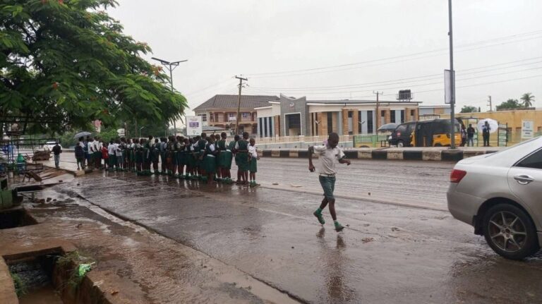 Tinubu's Condolence Visit To Benue Sparks Outrage As Schoolchildren Forced Into Rainy Street Parade