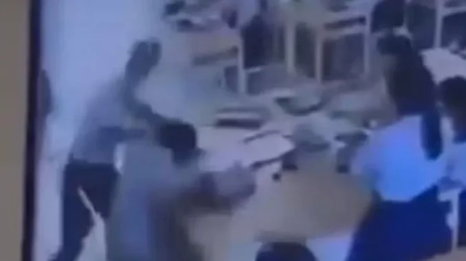 A 17-year-old student has been expelled from a private school in Thailand’s Uthai Thani province after he violently assaulted his mathematics teacher for refusing to change his test score. The incident occurred on 5 August, after the male student received 18 out of 20 marks in a midterm mathematics examination. Dissatisfied with the grade, he confronted his female teacher, insisting he deserved a perfect score. The teacher explained that while his answers were correct, he had failed to show his working process, which was a requirement for full marks. She further encouraged him to verify her marking approach with other staff members. After consulting with several colleagues who confirmed her methods, the student returned to demand an increase in his score. When the teacher refused, the Grade 11 pupil became agitated, kicked a desk, and left the classroom. He reappeared about 10 minutes later, demanding an apology. When the teacher asked who ought to apologise, the teenager lost his temper and launched a violent attack. In front of about 20 classmates, he repeatedly punched the teacher in the head and chest before delivering a forceful kick. In total, he struck her 17 times. The injured teacher was rushed to hospital, where she was treated for broken ribs, a swollen head, and a bruised eye. She has filed a police report and is expected to provide a full statement to investigators. The student has since been removed from the school, while his parents have reached out to the teacher to apologise for their son’s actions.